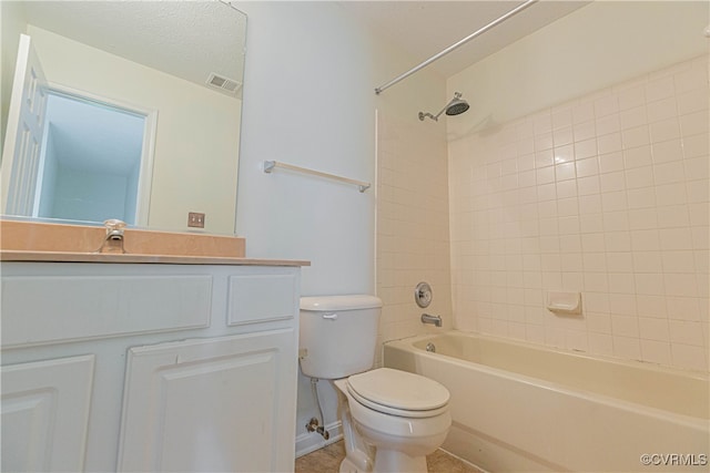 full bathroom featuring vanity, toilet, and tiled shower / bath