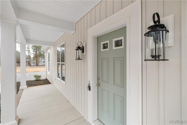 property entrance featuring covered porch