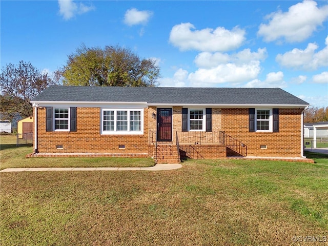 ranch-style home featuring a front lawn