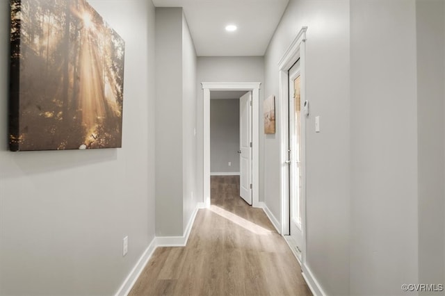 corridor featuring light hardwood / wood-style flooring