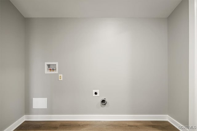 laundry area with electric dryer hookup, dark hardwood / wood-style flooring, and washer hookup