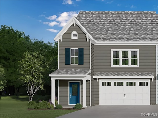 front facade with a garage and a front yard