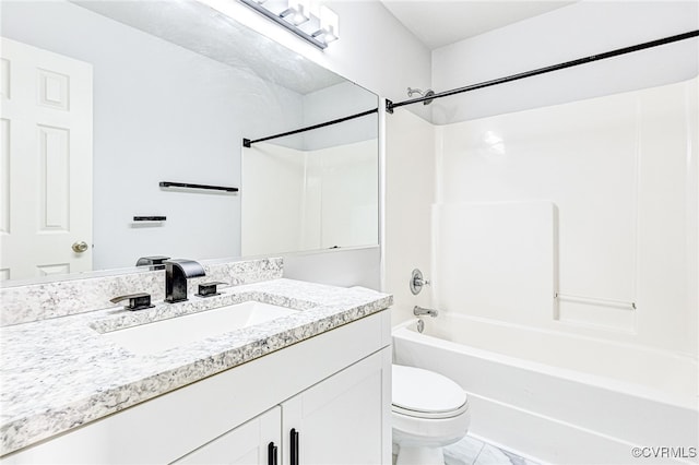 full bathroom with tile patterned flooring, vanity, toilet, and  shower combination