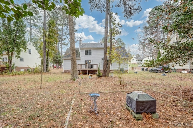 view of yard with a deck