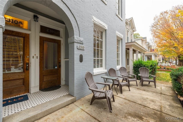 doorway to property with a porch