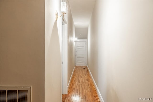 corridor featuring light wood-type flooring