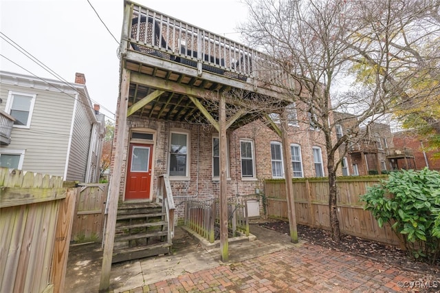 exterior space with a balcony