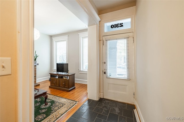 doorway to outside with dark hardwood / wood-style flooring