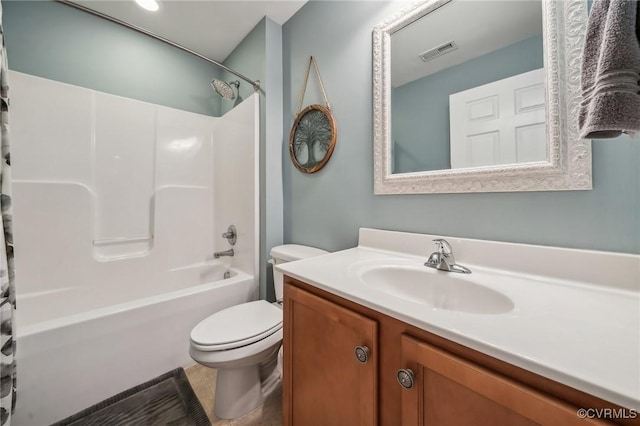 full bathroom featuring vanity, toilet, and tub / shower combination