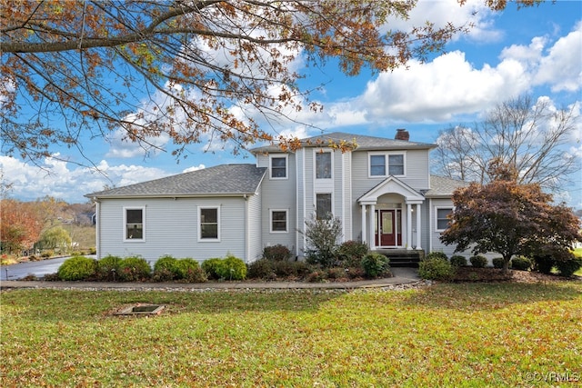 view of front property featuring a front yard