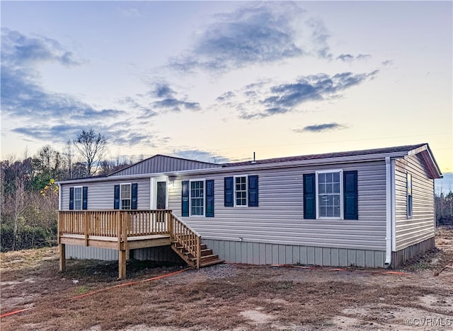 view of front facade with a deck