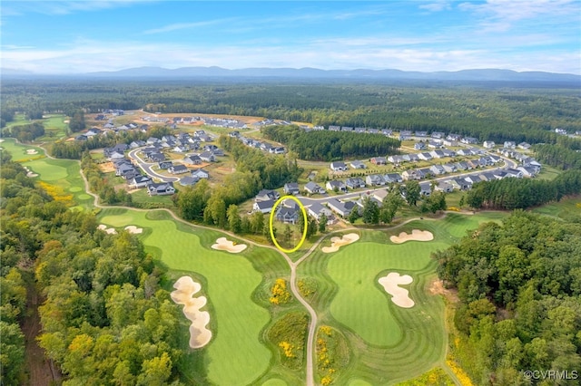 birds eye view of property featuring a mountain view