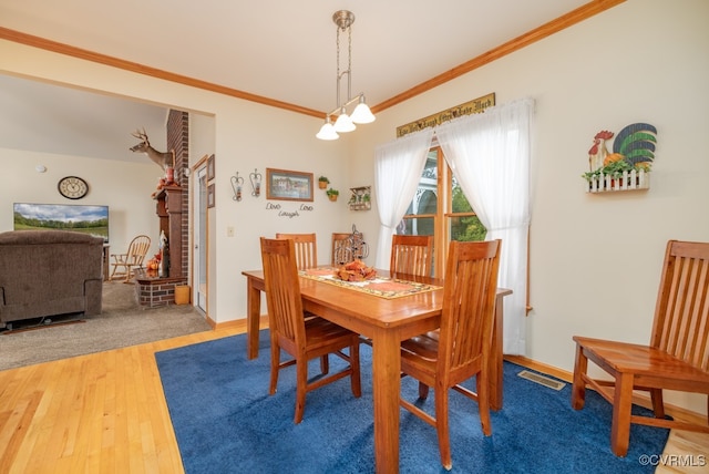 3548 Nutbush Rd, Victoria, VA 23974 - dining area with wood finished floors and ornamental molding