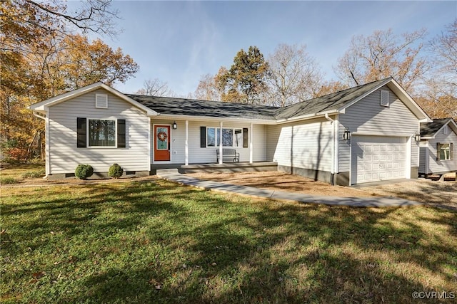 ranch-style house featuring a front yard, crawl space, driveway, and an attached garage