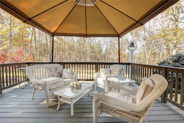 deck with a gazebo and outdoor lounge area