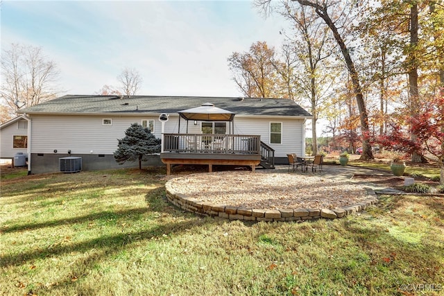 rear view of house featuring a yard, a gazebo, crawl space, central AC, and a wooden deck