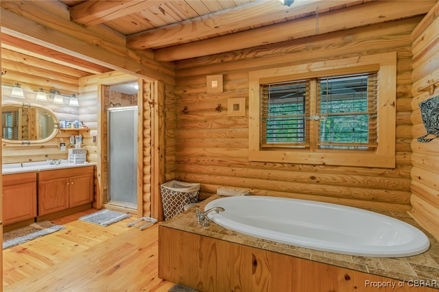 bathroom featuring beam ceiling, log walls, wooden ceiling, wood-type flooring, and independent shower and bath