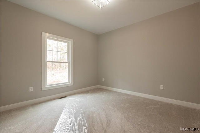 view of carpeted spare room