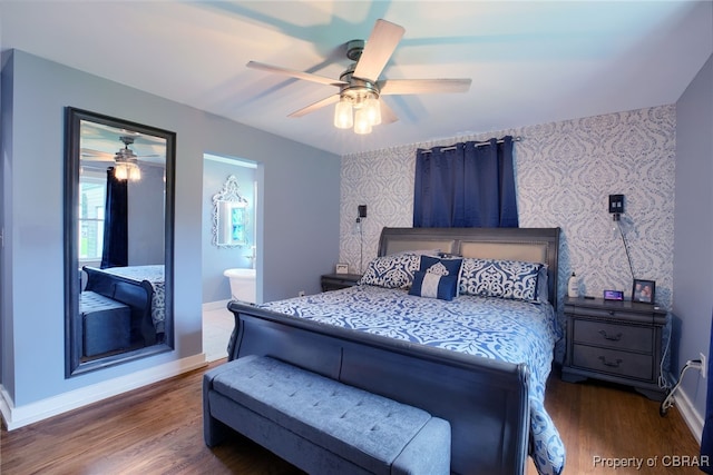 bedroom with ensuite bath, ceiling fan, and dark wood-type flooring