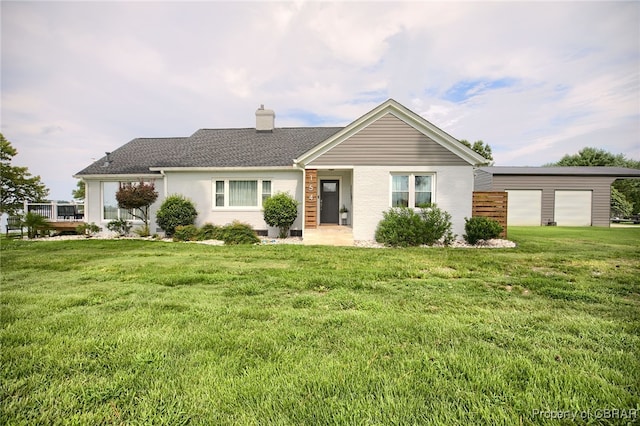 ranch-style home featuring a front yard