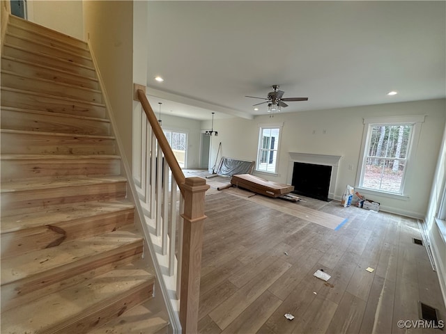 interior space featuring ceiling fan and hardwood / wood-style floors