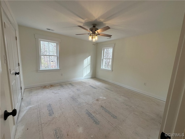 spare room with ceiling fan