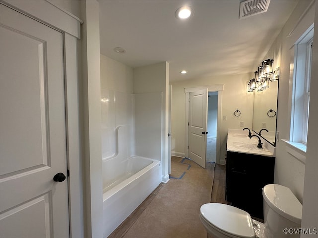 bathroom featuring vanity and toilet