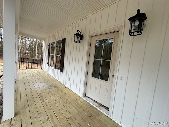 wooden terrace featuring a porch