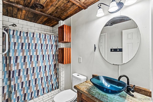 bathroom featuring toilet, wooden ceiling, vanity, and a shower with shower curtain