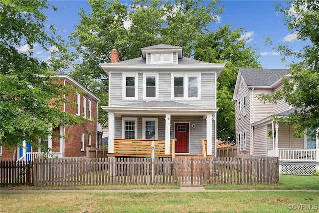 view of front of property featuring covered porch