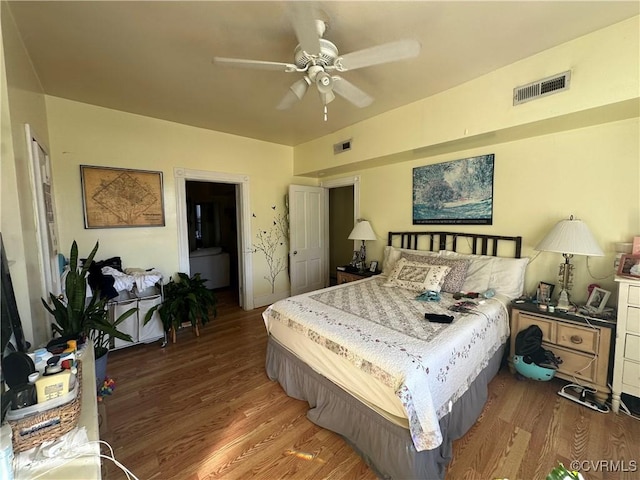 bedroom featuring hardwood / wood-style flooring and ceiling fan