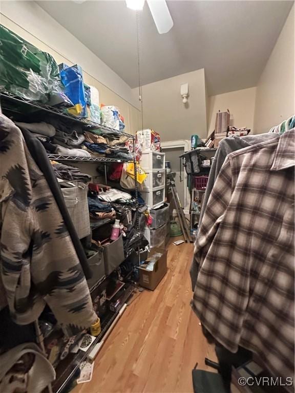 spacious closet featuring ceiling fan and hardwood / wood-style floors