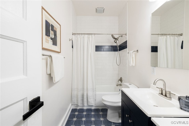 full bathroom with visible vents, shower / bath combo, vanity, and toilet