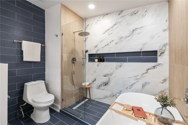 full bathroom with toilet, tile walls, a tile shower, tile patterned floors, and a bathtub