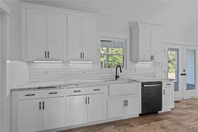 kitchen with dishwasher, french doors, sink, white cabinets, and light wood-type flooring