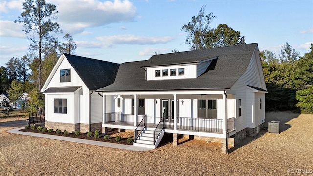 view of front of house featuring central AC and covered porch