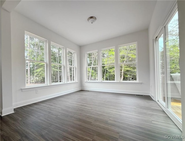 2047 Swiss Ln, Hayes, VA 23072 - unfurnished sunroom featuring baseboards and wood finished floors