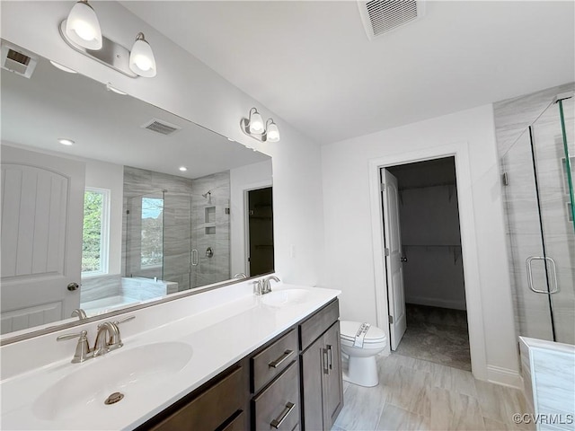 2047 Swiss Ln, Hayes, VA 23072 - full bath with a walk in closet, a shower stall, double vanity, and a tub