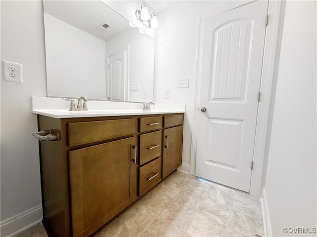 2047 Swiss Ln, Hayes, VA 23072 - full bath with double vanity and baseboards