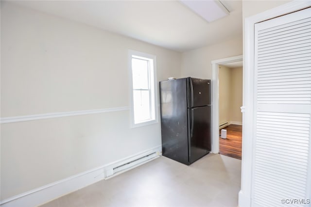 kitchen featuring black refrigerator