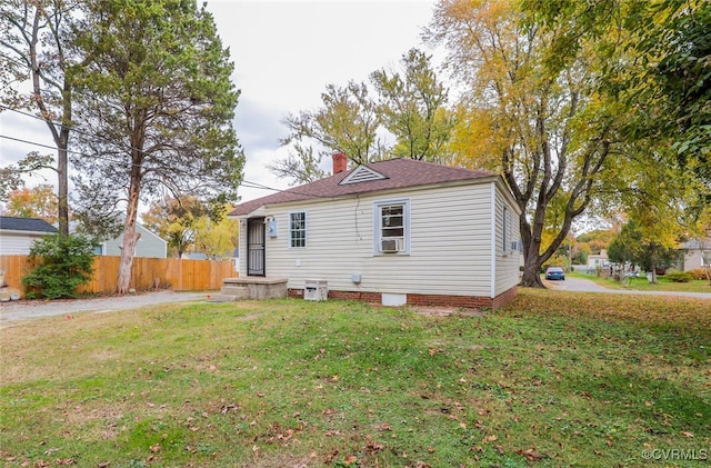 exterior space featuring a front lawn