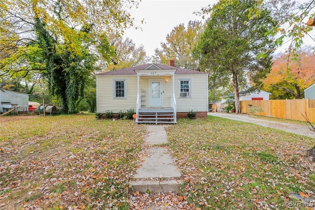 view of front of property with a front lawn