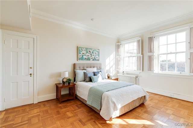 bedroom featuring radiator, light parquet flooring, and ornamental molding