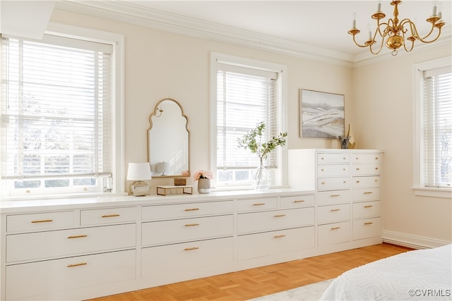 bedroom with multiple windows and light parquet flooring