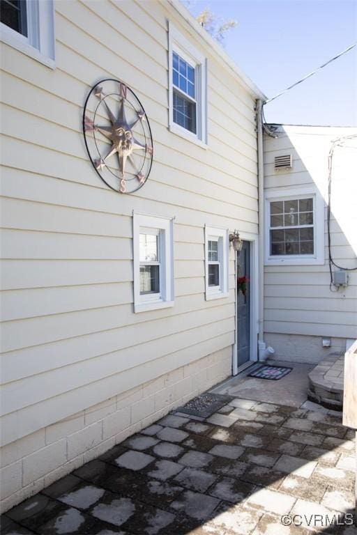 rear view of property with a patio area