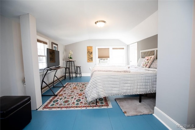 bedroom featuring cooling unit and vaulted ceiling