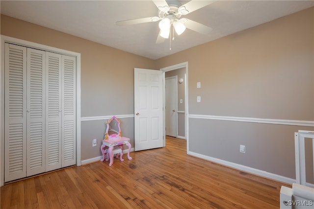 game room with ceiling fan and light hardwood / wood-style flooring