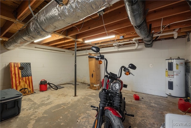 basement featuring electric water heater