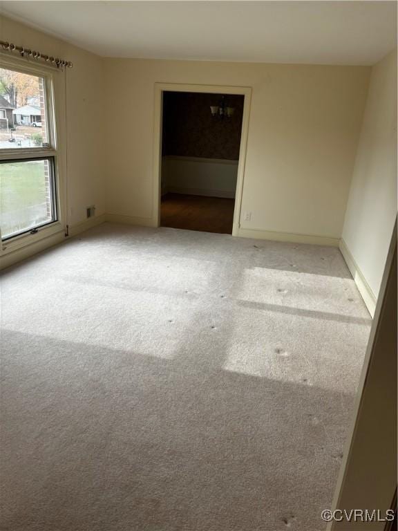 view of carpeted spare room