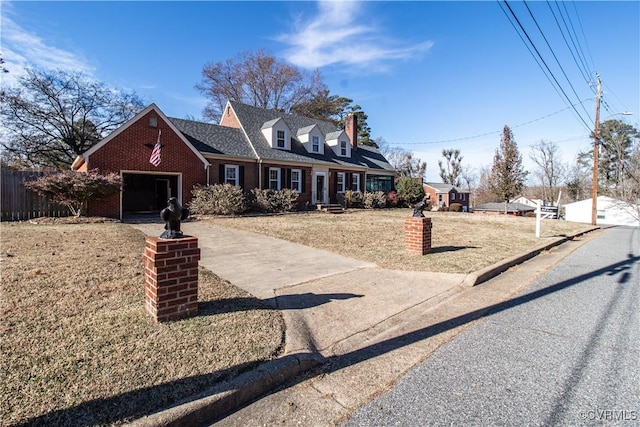 new england style home with a front lawn